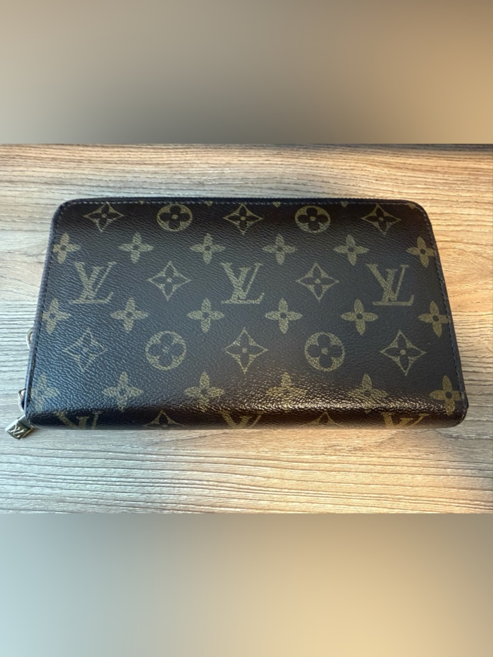 Louis Vuitton Monogram Canvas Zippy Wallet.